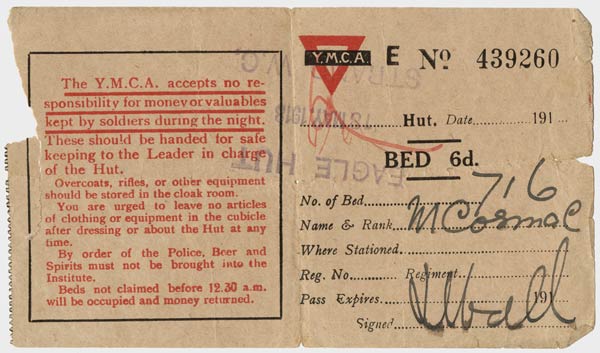 Scan of a yellowing ticket printed with the YMCA logo, information about Bed No. 716, the soldier occupying the bed, and a disclaimer about money and valuables.
