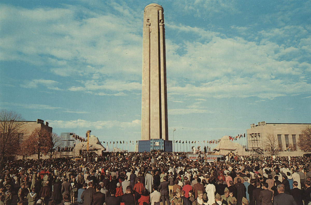 Vintage color photograph of a large crowd filling the mall in front of the Liberty Memorial.