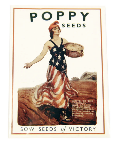 Photograph of a seed packet printed with a painting of a white woman dressed in a U.S. flag-themed dress scattering seeds in a field from a basket