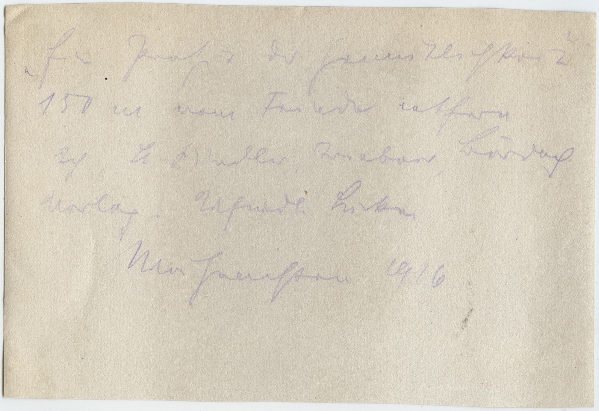 Back of an old photograph with faded blue writing in cursive German