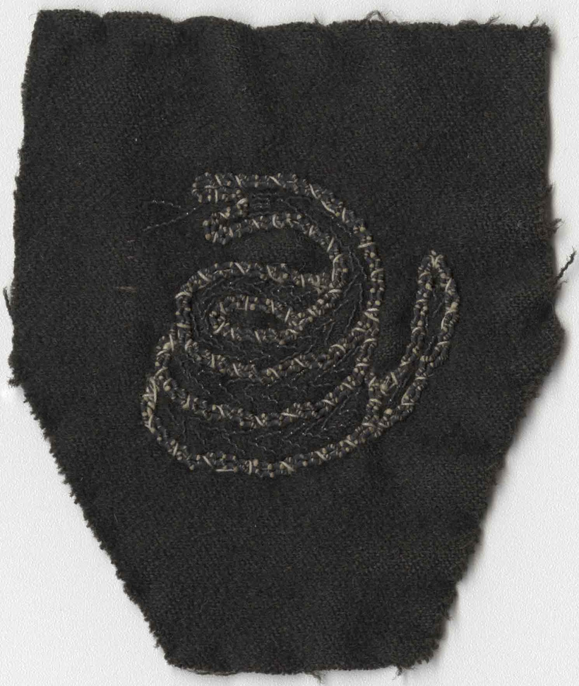 Insignia patch embroidered with a rattlesnake