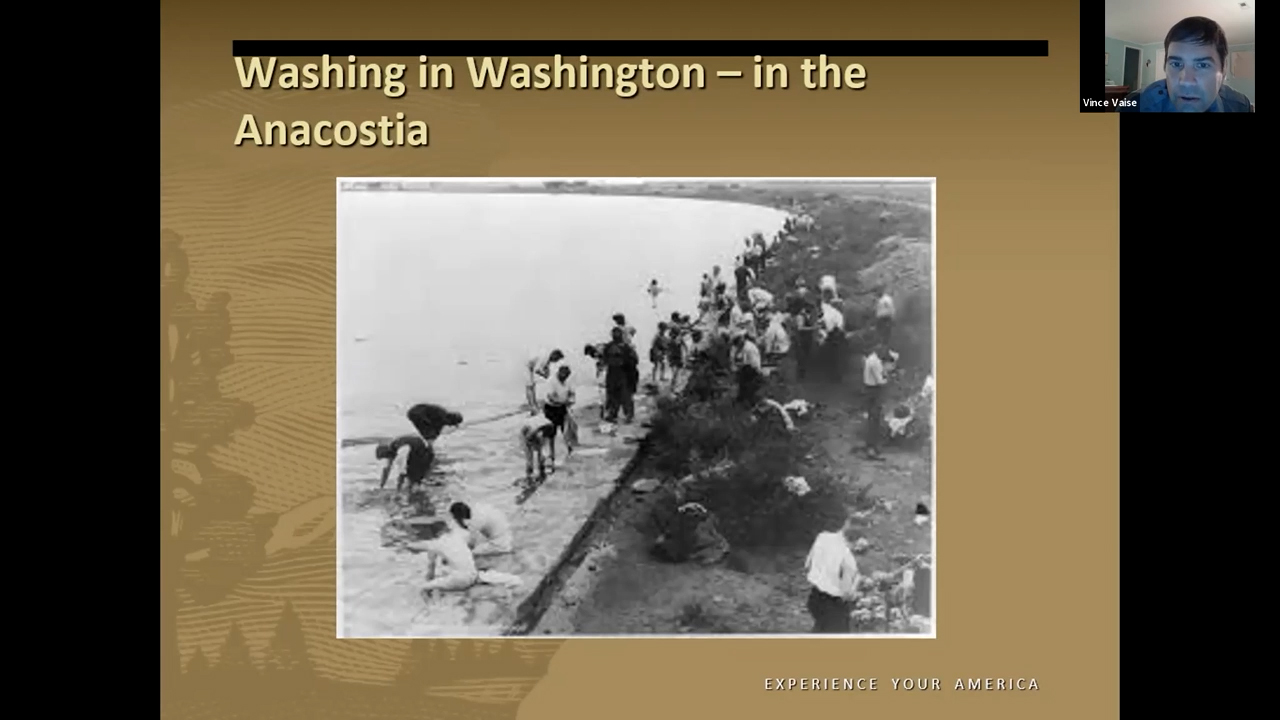 Black and white phot of men bathing in a river