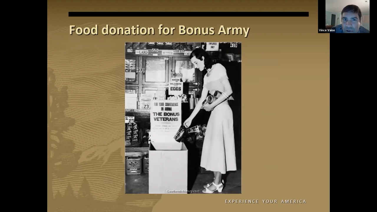Black and white photo of a woman adding canned goods to a receptacle labeled 'For your convenience in aiding the Bonus Veterans'