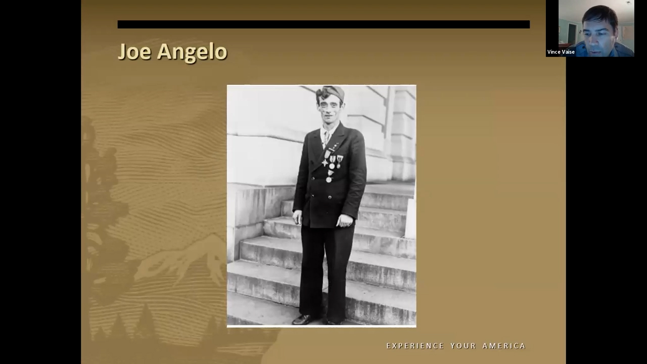 Portrait photo of a thin white man in WWI military uniform decorated with medals