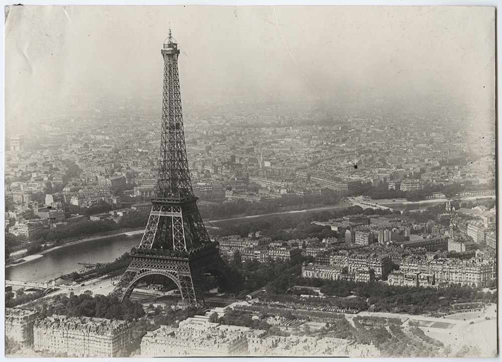 Black and white historical aerial photo of Paris and the Eiffel Tower