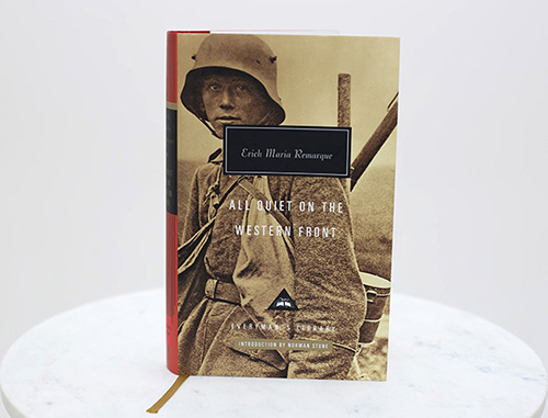 Modern photo of a hardcover book featuring a sepia-toned photo of a young German WWI soldier