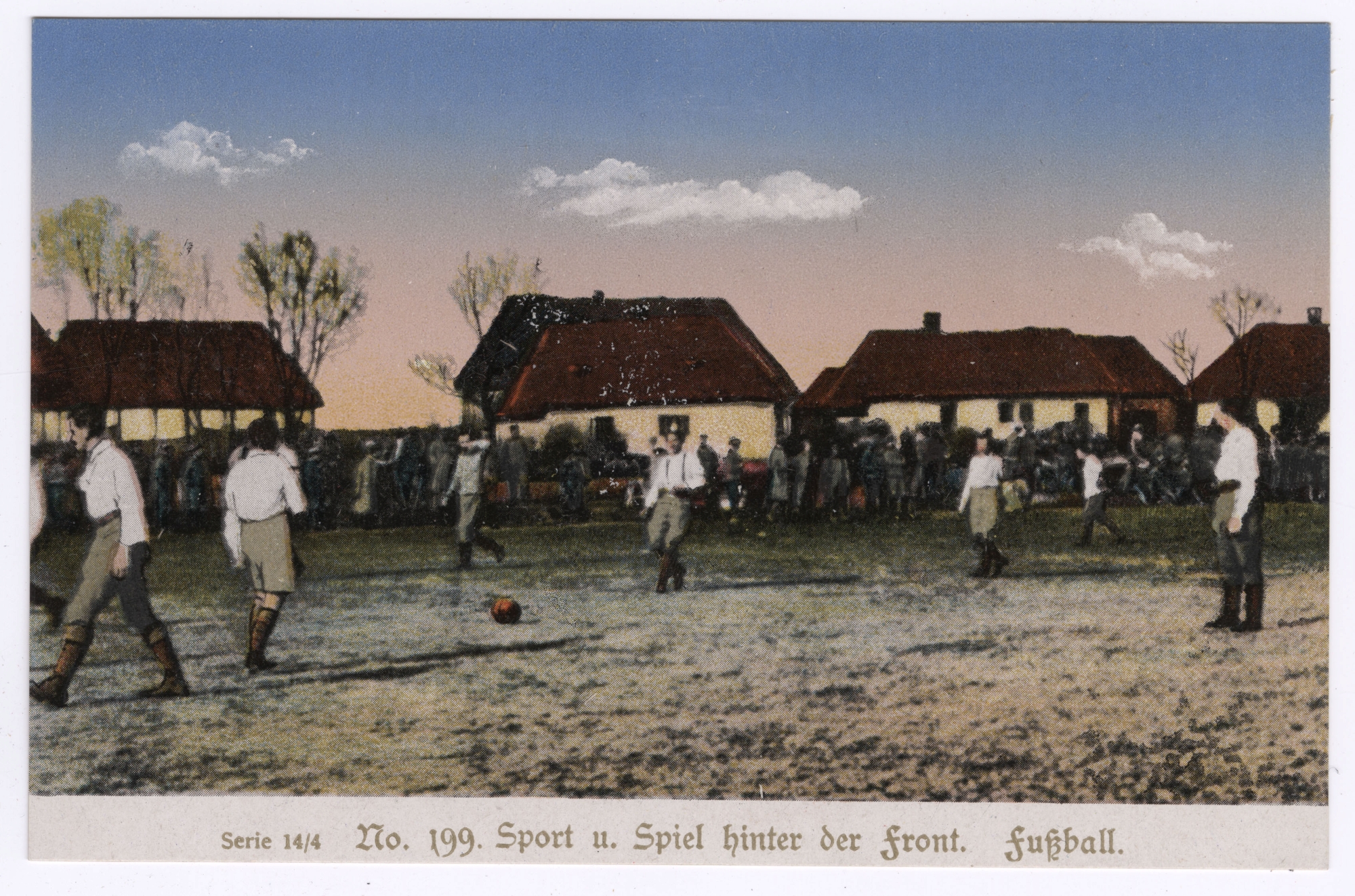 Colorized photo of a group of men playing soccer in a field. They are all wearing similar white shirts, khaki pants, and boots. In the background there are several buildings that look like houses and soldiers standing around. The sky is colorized to look like sunrise. There is a caption at the bottom that reads: Serie 14/4 No. 199. Sport u. Spiel hinter der front. fußball.