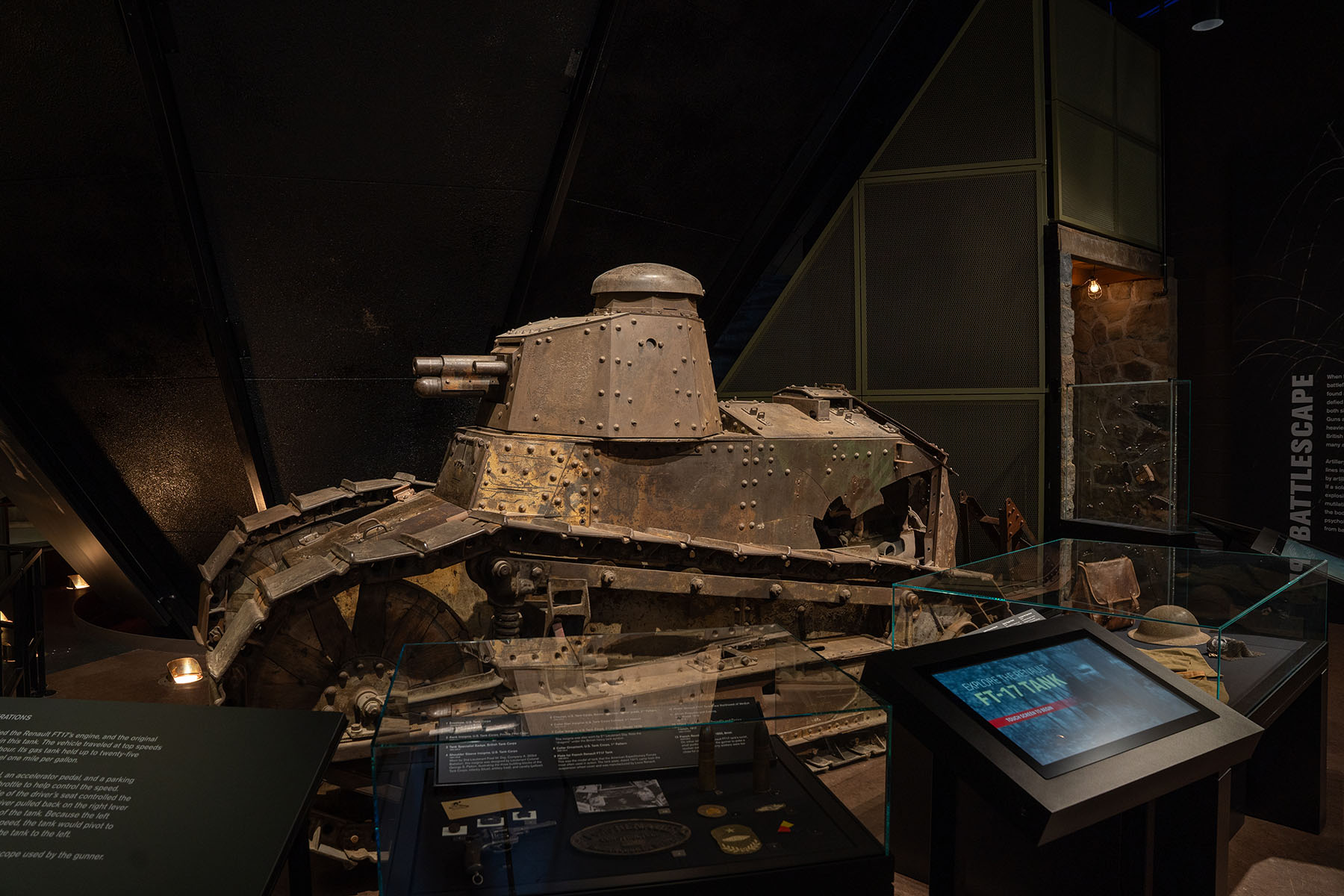 A small armored tank in a museum exhibit