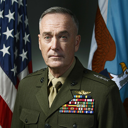 Older white man with close-cropped grey hair wearing a military uniform