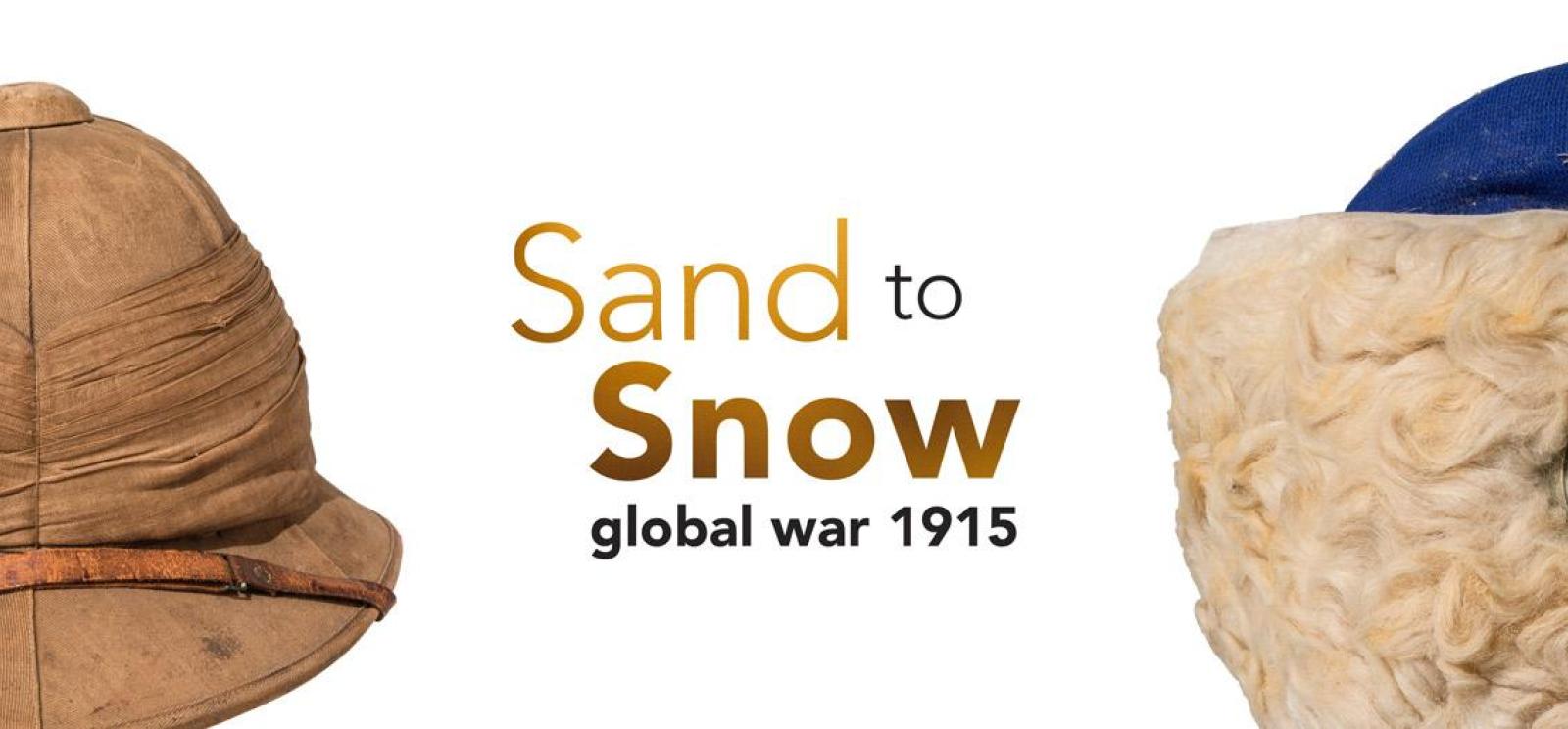 الصورة: قبعة سفاري وقبعة شتوية من الفرو. النص: Sand to Snow Global War 1915