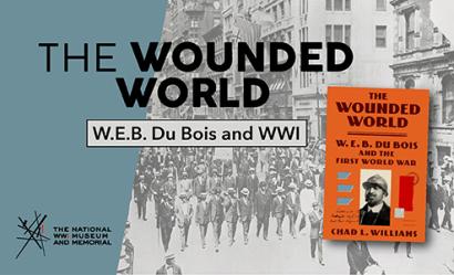Background image: black and white photograph of rows of Black men in suits walking down a city street. Foreground image: an orange book cover featuring a black and white portrait photograph of a Black man wearing a doughboy helmet. Text: 'The Wounded World / W.E.B. Du Bois and WWI'