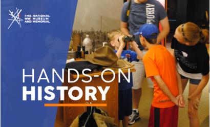 Image: Modern photograph of several children gathered around a table filled with WWI artifacts. One child holds binoculars up to his face. Text: 'Hands-on History'