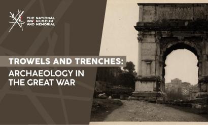 Black and white photo of an ancient Roman arch