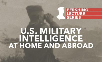 Black and white photo of a man in WWI military field uniform gazing into a distant landscape with a pair of binoculars