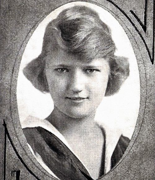 Black and white yearbook photo of a white teenage girl with bobbed wavy hair