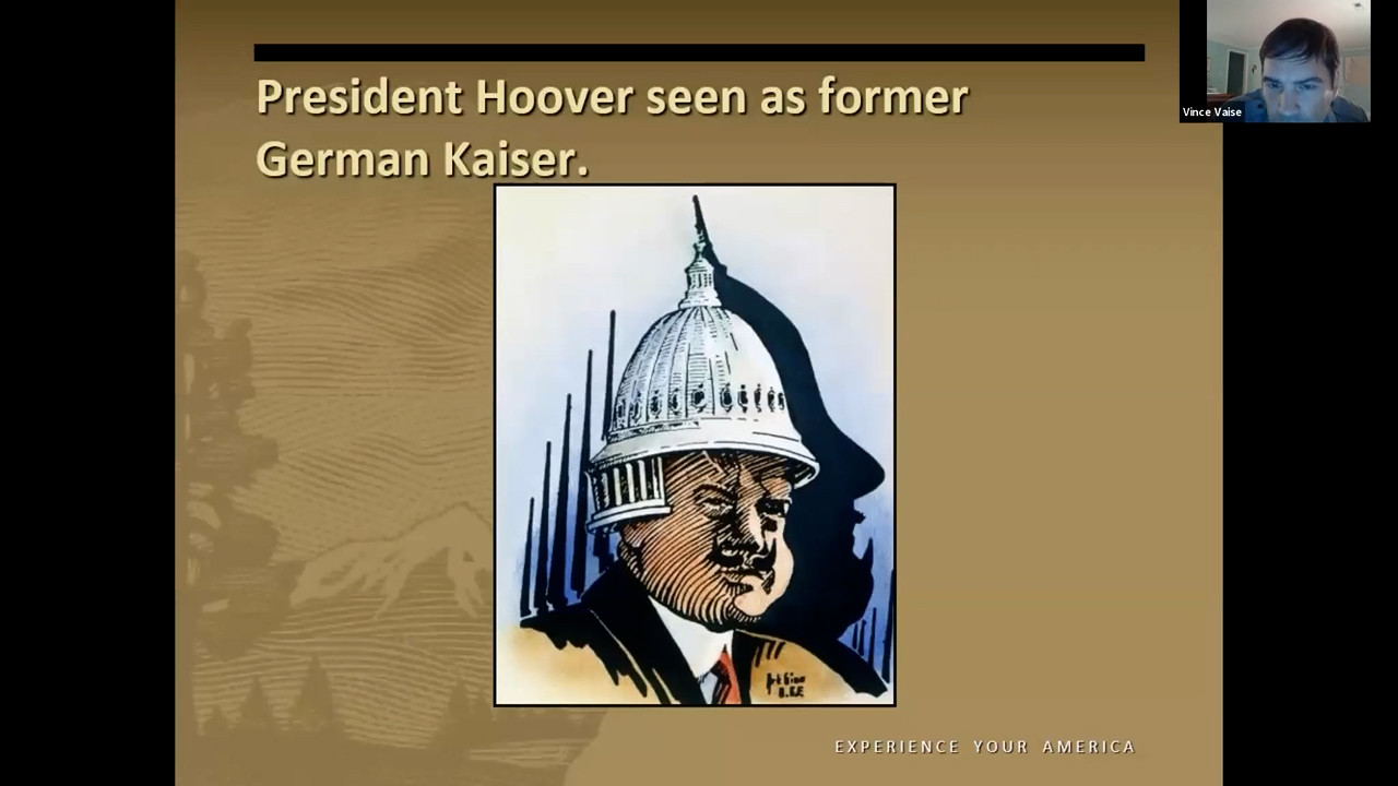 Political cartoon of Herbert Hoover wearing the Capitol building as a helmet, resembling a pickelhaube helmet