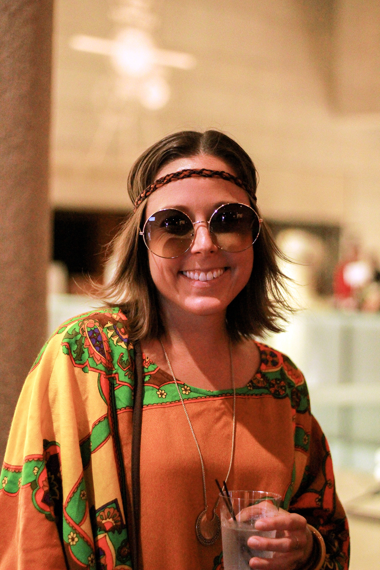 Modern photo of a guest dressed as a 1970s hippie